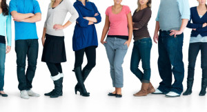 Variety of unknown people standing in a line